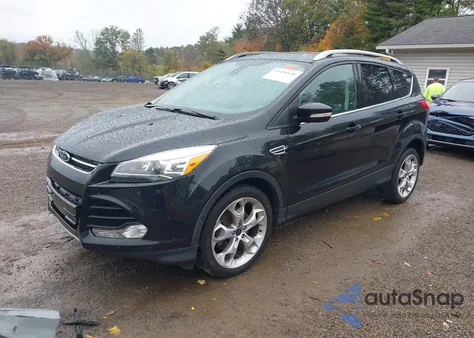 2015 Ford Escape Titanium z USA, uszkodzony, nr VIN 1FMCU9J90FUA39185
